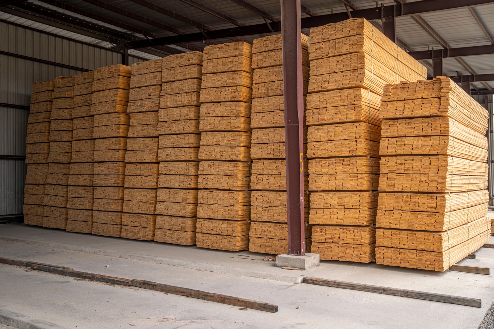Stacked lumber and building materials in a US warehouse